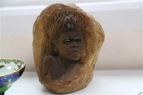 William Ricketts (1898-1993). Two stoneware sculptures of aboriginal men and a boy, 19cm (7.5in.) & 24cm (9.5in.)